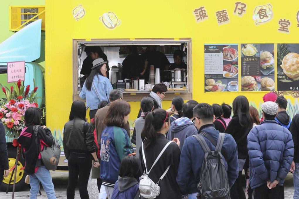Long queues for Pineapple Canteen food truck at Wong Tai Sin Square. Photo: Edward Wong