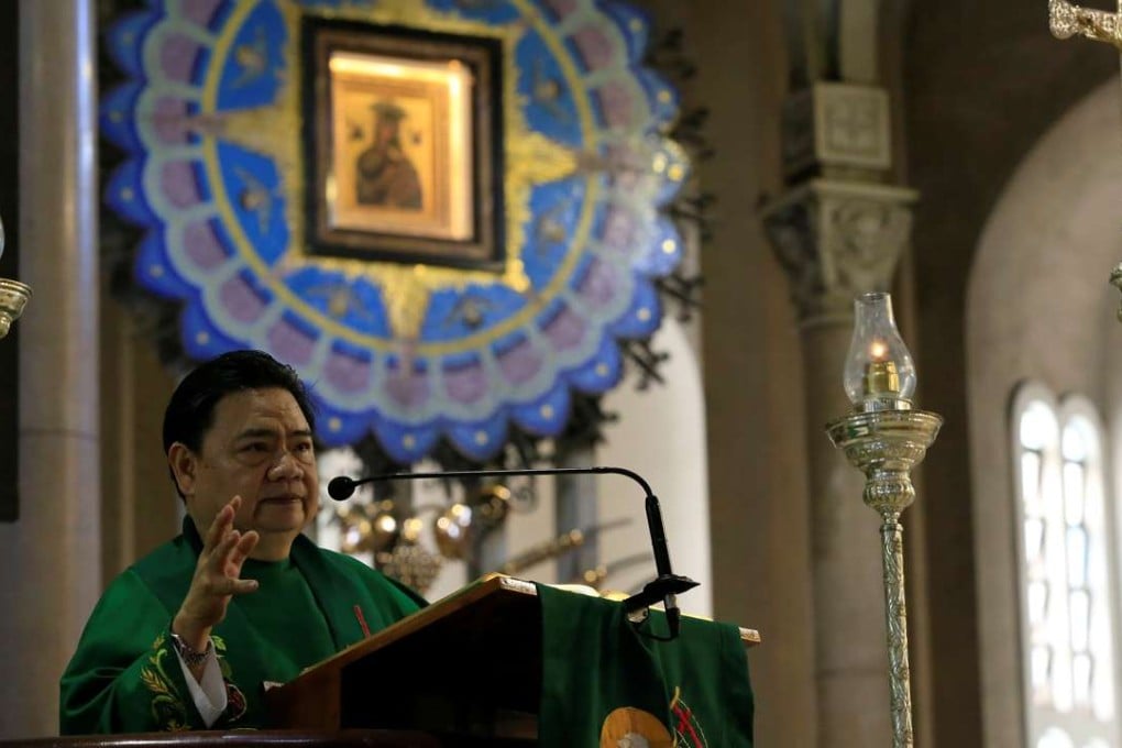 Reverend F. Carlos Ronquillo gestures as he talks about a pastoral letter from the Catholic Bishops' Conference of the Philippines about the drug war of President Rodrigo Duterte. Photo: Reuters