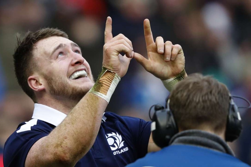 Scotland's Stuart Hogg celebrates after scoring his second try. Photo: Reuters