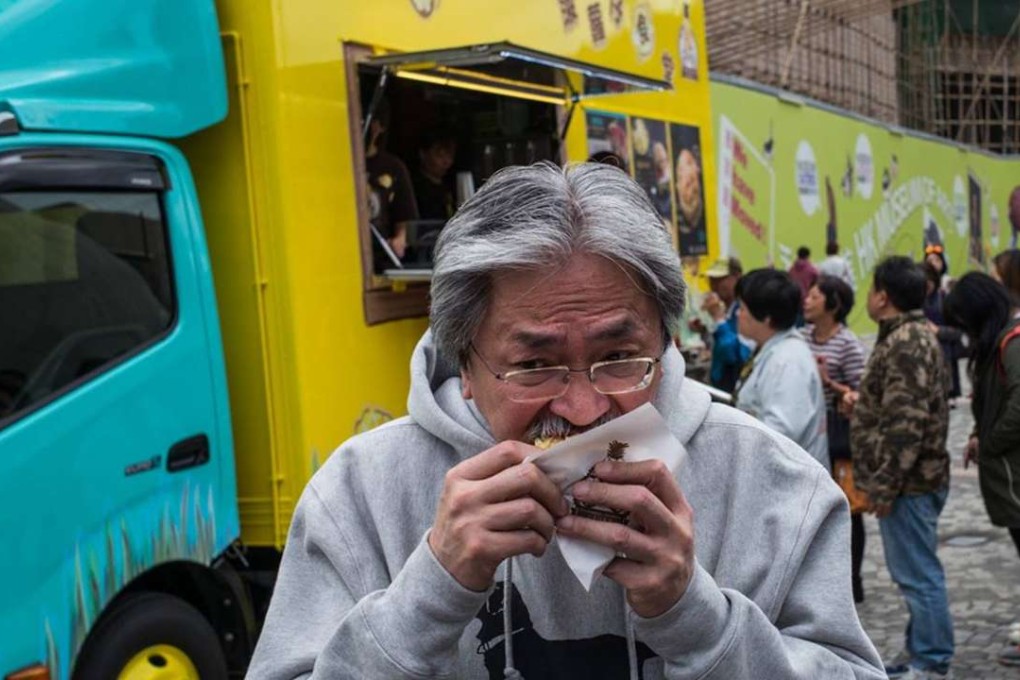 John Tsang tries out one of the city’s new food trucks on Saturday. Photo: Facebook