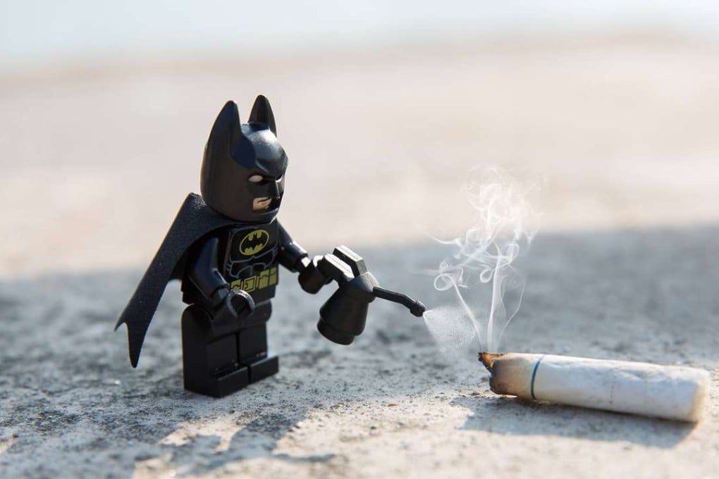 A discarded cigarette is no match for the Lego Batman. Photo: Ric Tse