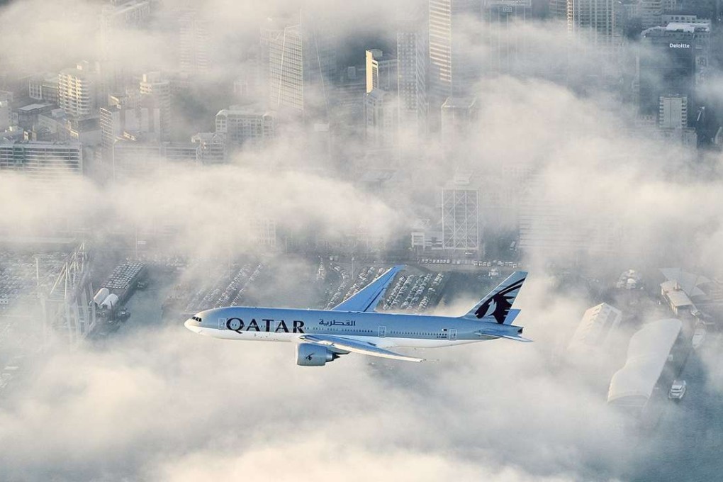 Qatar Airways’ first flight to New Zealand flies over the city of Auckland on its final approach to the airport. Photo: Qatar Airways