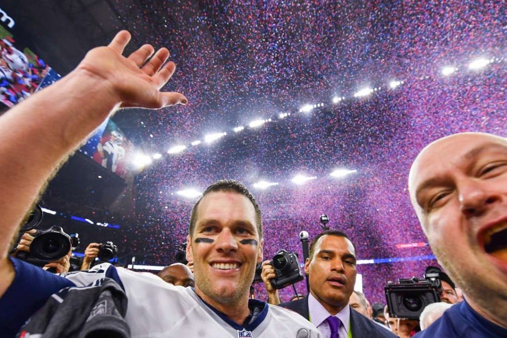 New England Patriots quarterback Tom Brady celebrates during the post-game ceremony for Super Bowl LI. Photo: TNS