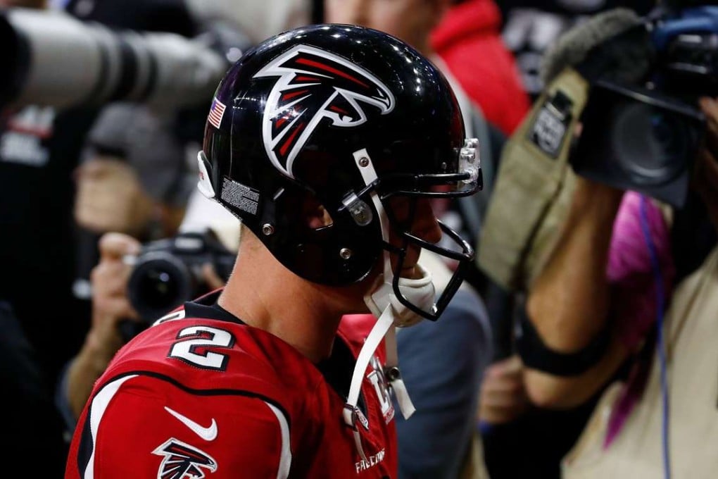 Atlanta Falcons quarterback Matt Ryan walks off the field after losing the Super Bowl. Photo: AFP