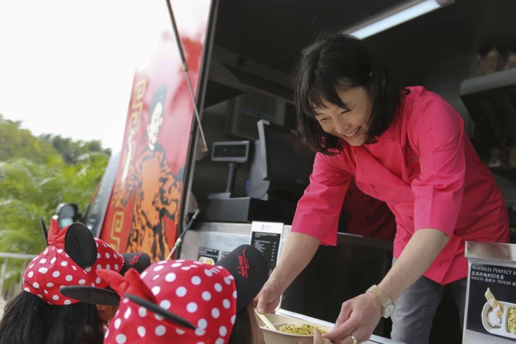 Operator Maureen Loh serves customers. Photo: Xiaomei Chen