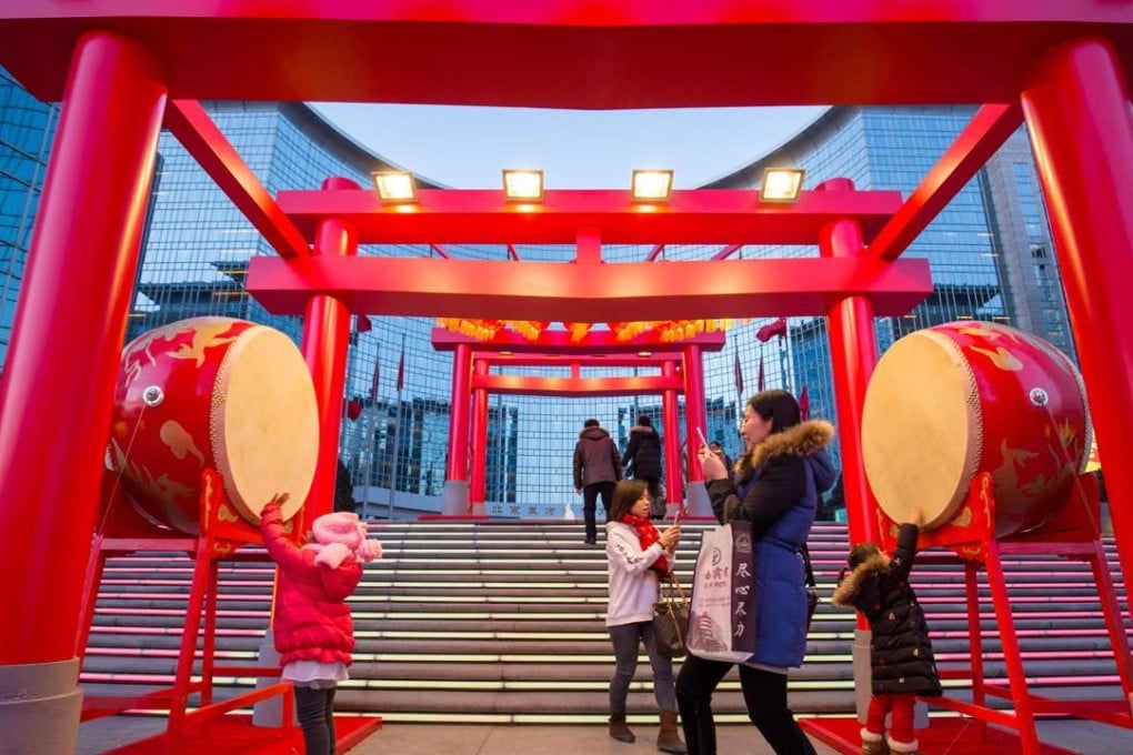 Lunar New Year decorations on the front steps of the ever-popular Oriental Plaza in Beijing. Photo: SCMP handout