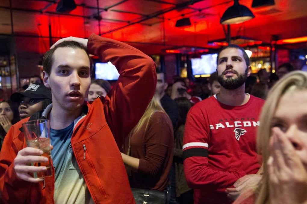 Atlanta Falcons fans react after the New England Patriots win Super Bowl 51. Photo: AP