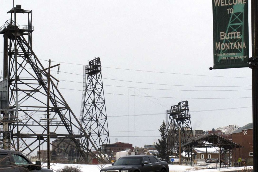 In this December 14, 2016 photo, old mining headframes dominate the skyline of Butte, Montana. Residents of the Montana mining city of Butte say the deaths of more than 3,000 snow geese should be a wake-up call for the future of a former open pit mine that is filled with 50 billion gallons of acidic, metal-laden water. Photo: AP