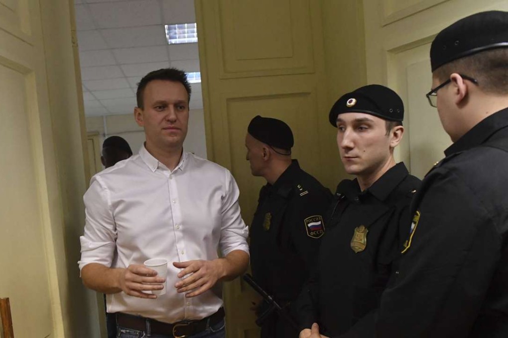 Russian opposition leader Alexei Navalny enters the courtroom in Kirov, Russia, on Wednesday, to be found guilty in the retrial of a 2013 fraud case. Photo: AP