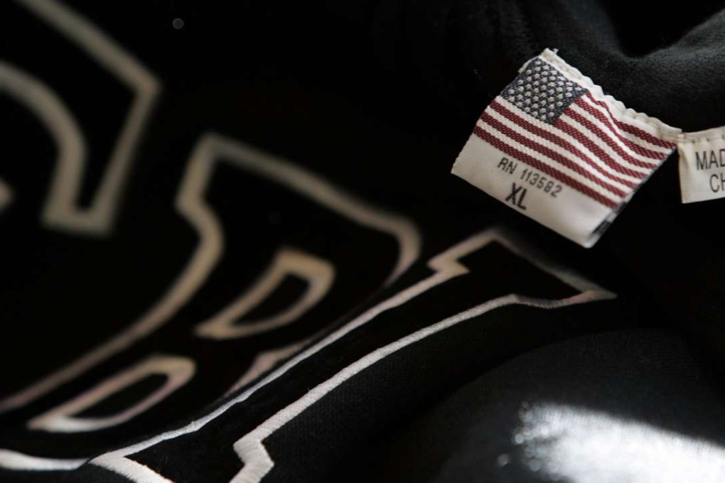 File photo of a sweatshirt with the FBI initials and American flag that was made in China. Photo: AFP