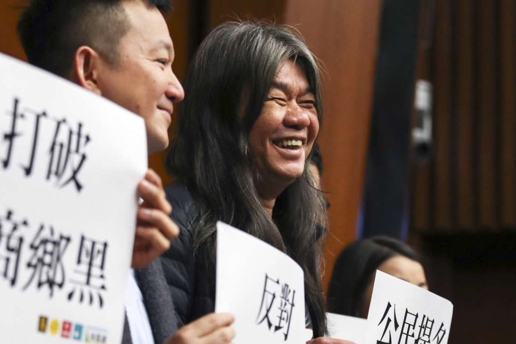 Lawmaker ‘Long Hair’ Leung Kwok-hung (centre) announces his intention to run for chief executive. Photo: Nora Tam