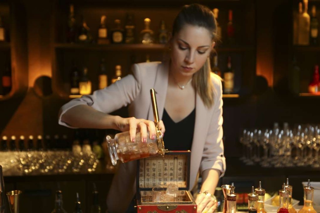 Pirata Group beverage manager Isabella Vannoni pours a Smoking Gun at TokyoLima in Central. Photos: Xiaomei Chen