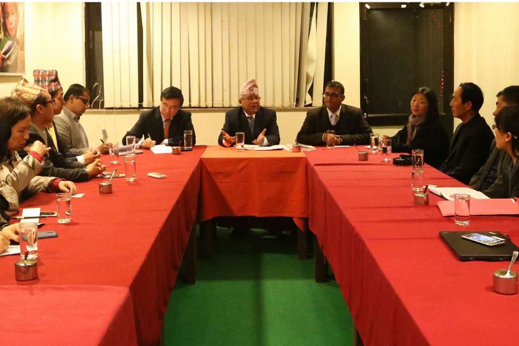 Members of a Chinese think tank meet the Nepalese former prime minister, Madhav Kumar Nepal, in Kathmandu. Photo: Xinhua