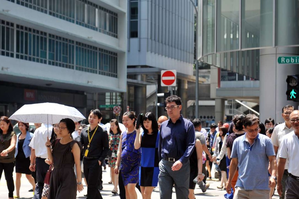 Singaporean workers must be prepared to continually pick up new skills, says the Committee on the Future Economy. Photo: Straits Times
