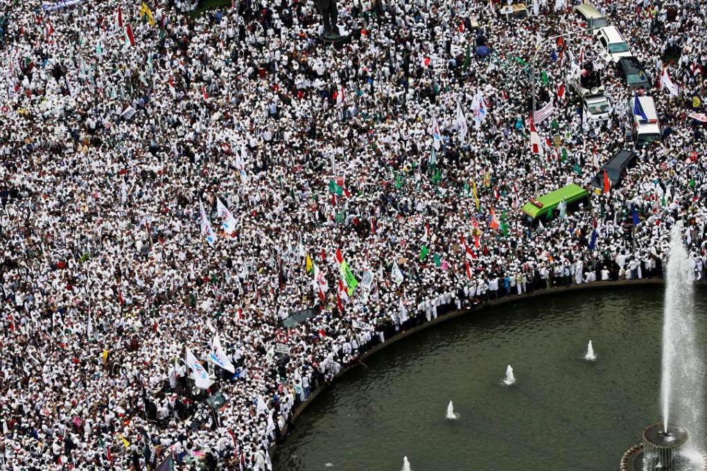 Members of hardline Muslim groups attend a protest against Jakarta's incumbent governor Basuki Tjahaja Purnama, in November. Photo: Reuters