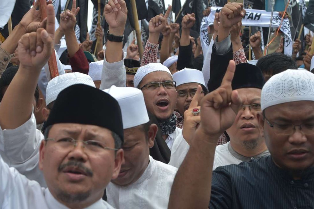 Indonesian police urged Islamists leading opposition to Jakarta’s Christian governor to ensure a mass prayer remains peaceful. Photo: AFP
