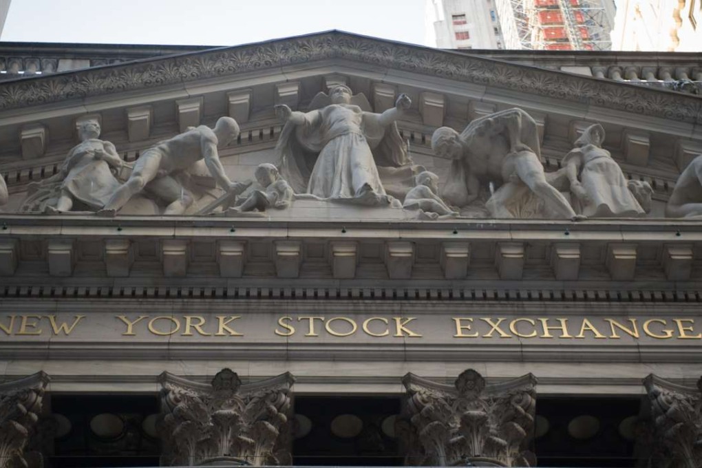 The exterior of the New York Stock Exchange during the closing bell, February 10, 2017 in New York. Wall Street stocks pushed to fresh records Friday, again rallying off comments from US President Donald Trump signalling imminent action on tax cuts. Photo: AFP