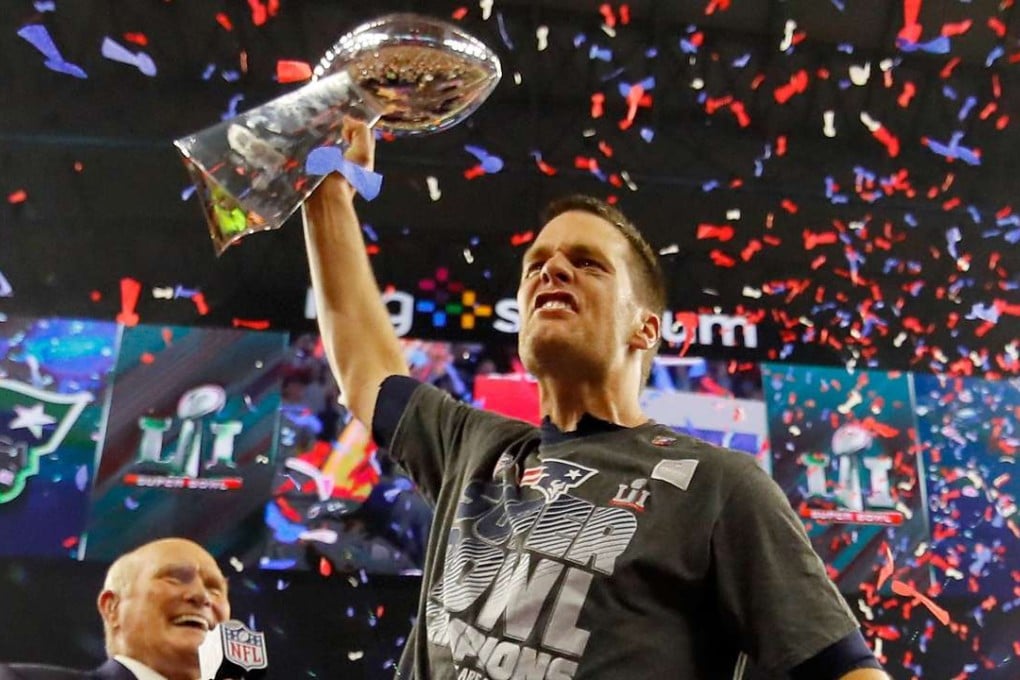 Tom Brady of the New England Patriots celebreates with the Vince Lombardi Trophy. Photo: AFP