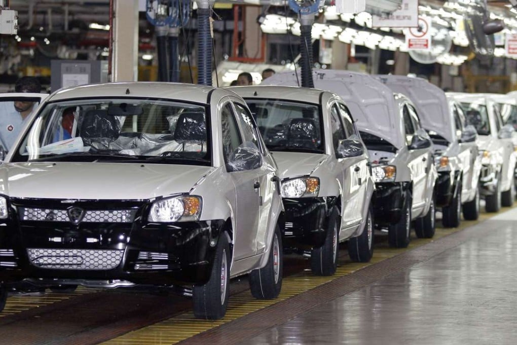 Proton Saga cars on the assembly line in Shah Alam. Malaysia’s former prime minister, Mahathir Mohamad, called the car a ‘symbol of Malaysians as a dignified people’. Photo: AFP