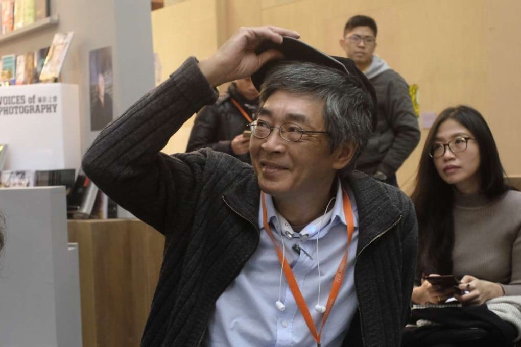 A file picture of Lam Wing-kee (centre), one of the Hong Kong booksellers caught up in the crackdown on the mainland on the sale of unauthorised Hong Kong-published books. Photo: AFP