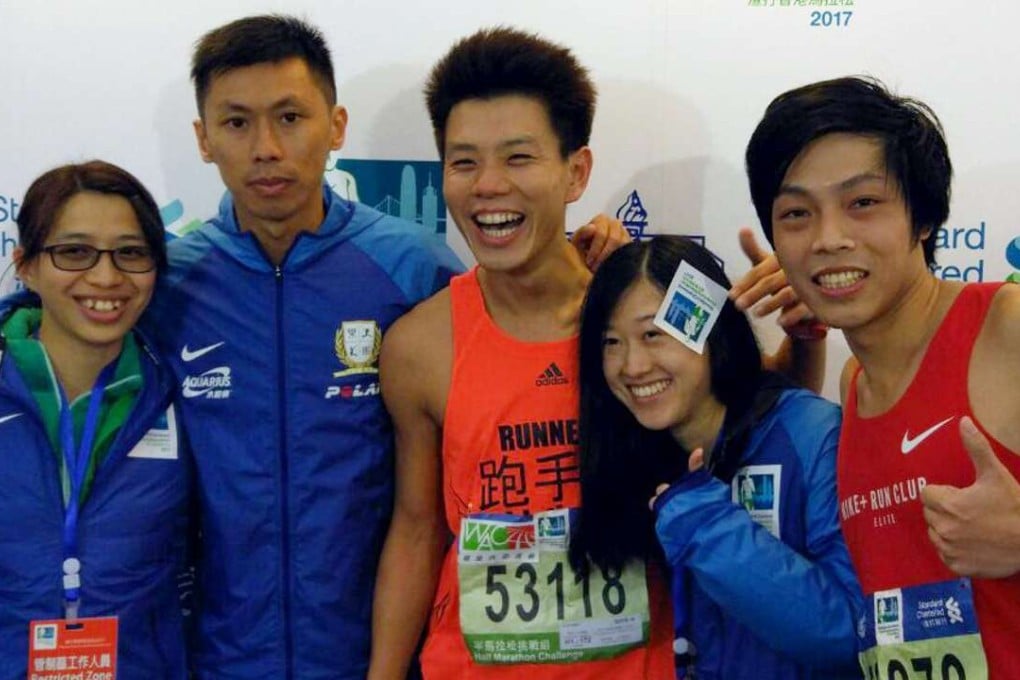Gi Ka-man (centre) after the half marathon. Photo: James Porteous