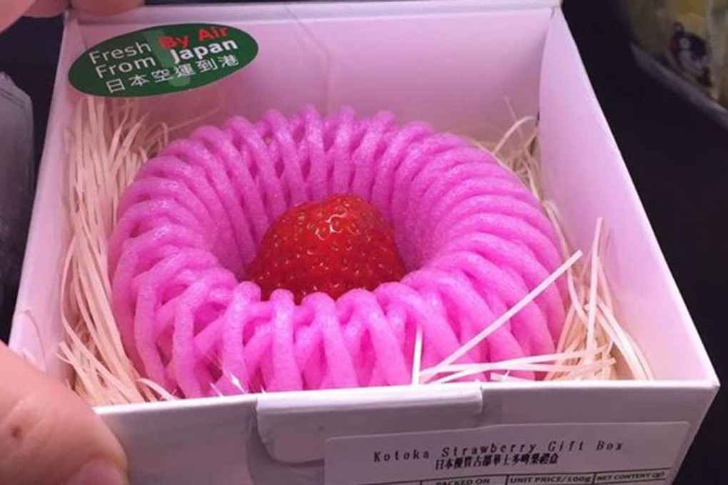 An individually packaged strawberry from Kotoka, Japan, on sale for HK$168 as a Valentine’s Day gift at City’super in Causeway Bay, Hong Kong. Photo : SCMP