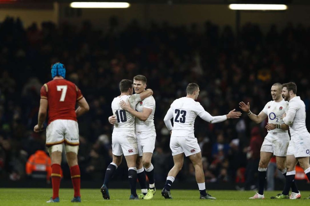 England players celebrate their win at the end of the Six Nations match against Wales in Cardiff. Photo: AFP