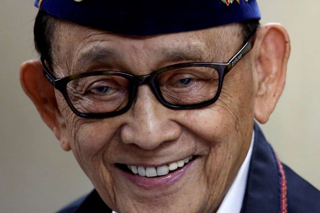 Former Philippine President Fidel Ramos reacts as he speaks to journalists during a trip to Hong Kong, China, after a Hague court's ruling over the maritime dispute in South China Sea, August 12, 2016. Picture taken August 12, 2016. REUTERS/Tyrone Siu/File Photo