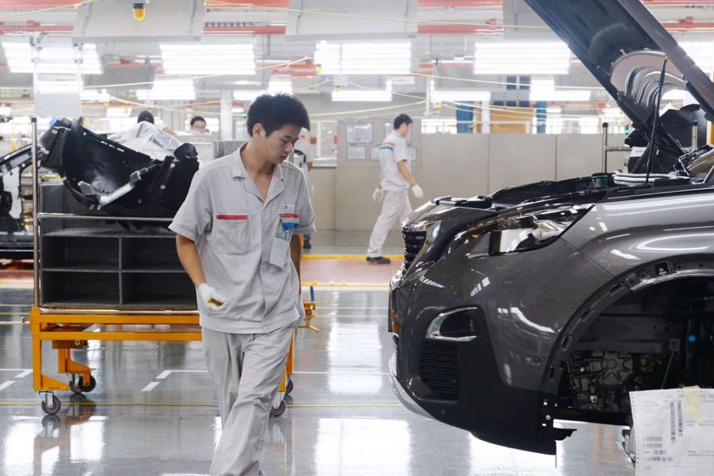 China’s passenger car sales in January dropped 1.1 per cent to 2.22 million vehicles from the same month last year. Photo: AFP