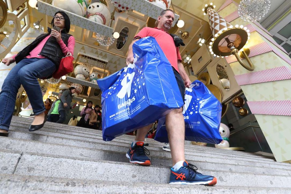 Customers shop in Tsim Sha Tsui. Photo: Edward Wong