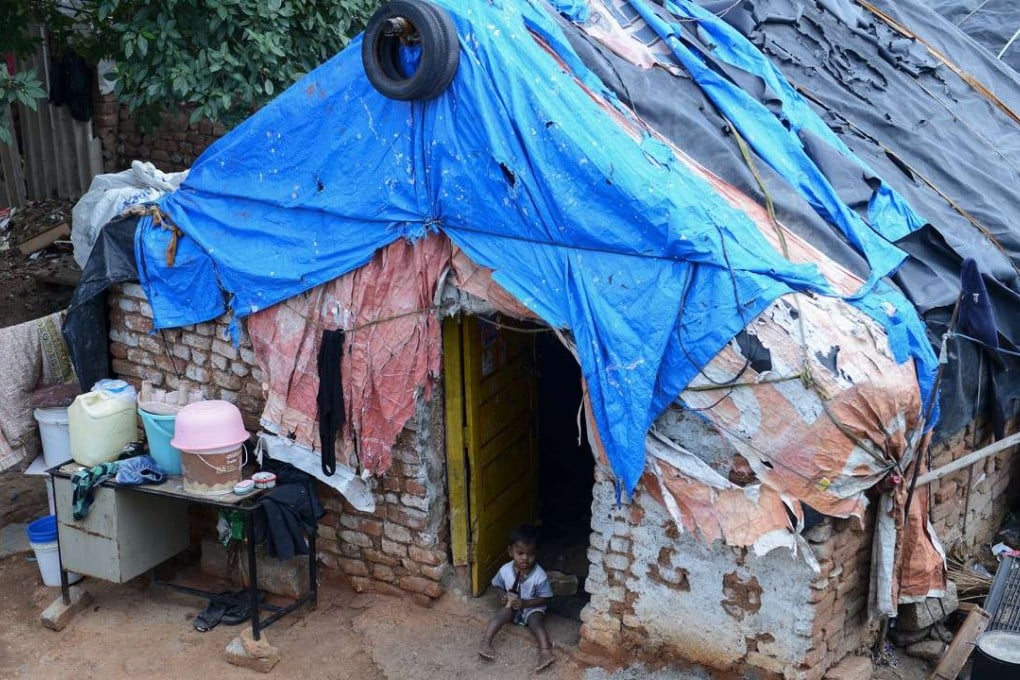 An Indian child at a temporary shelter in Hyderabad. The country’s prime minister, Narendra Modi, is considering introducing a universal basic income. Photo: AFP