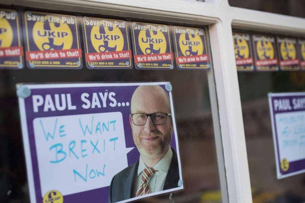 A poster displaying an image of UKIP (UK Independence Party) Leader, Paul Nuttall, and the words "We Want Brexit Now" is pictured in the window of the party's by-election campaign headquarters in Stoke-on-Trent, England. Photo: AFP
