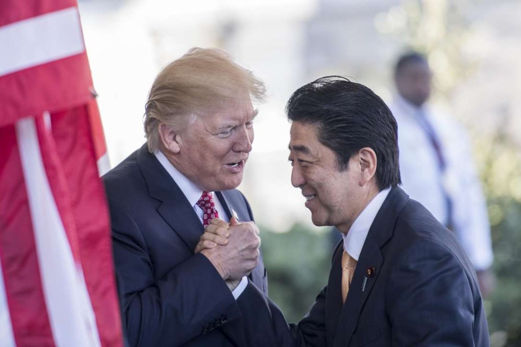 Japanese Prime Minister Shinzō Abe is greeted by President Donald Trump as he arrives at the White House in Washington, D.C. Washington Post photo by Melina Mara