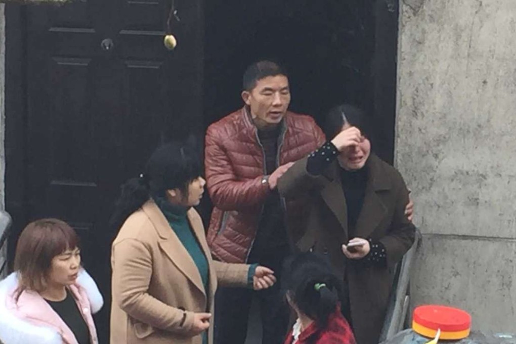 Families of coal mine workers wait for news about a blast at the Zoubao mine in Hunan province on February 14. Photo: Xinhua