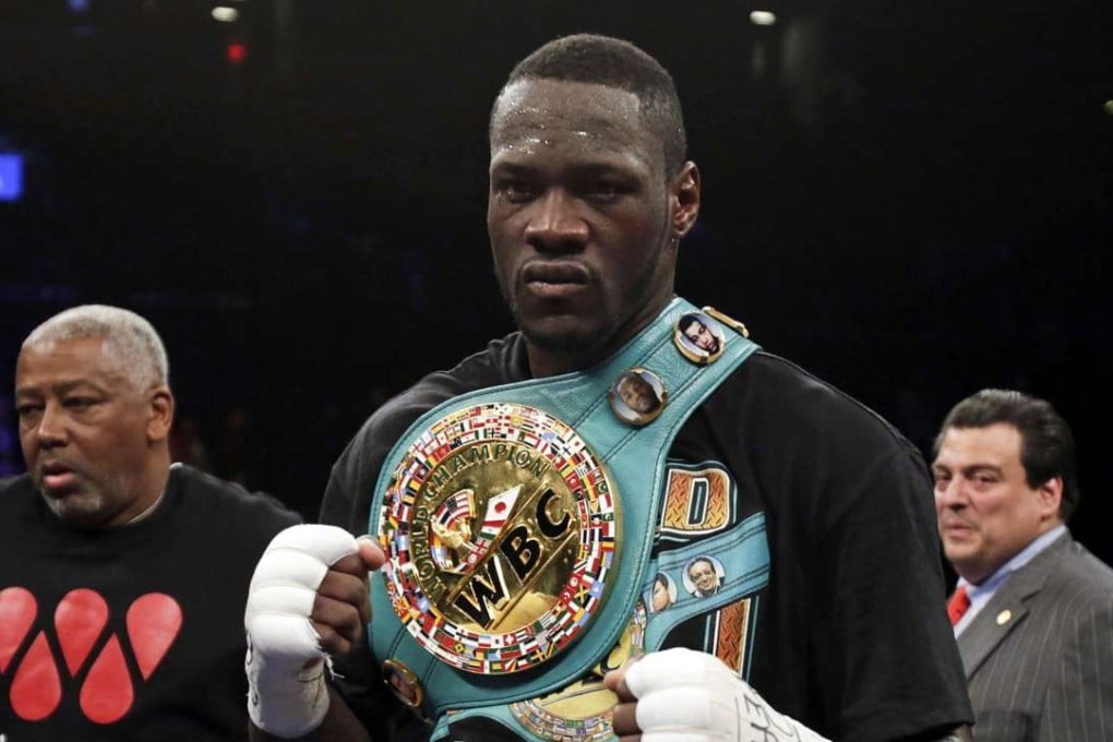 Deontay Wilder celebrates after knocking out Artur Szpilka in the ninth round of their heavyweight title fight. Photo: USA Today