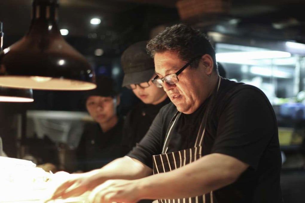 Chef Eduardo Vargas, owner of Azul in Shanghai, at work.