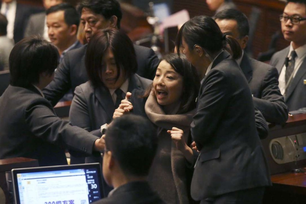 Legislator Lau Siu-lai was expelled from the chamber for playing a video during the chief executive’s question-and-answer session following his policy address last month. Photo: K. Y. Cheng