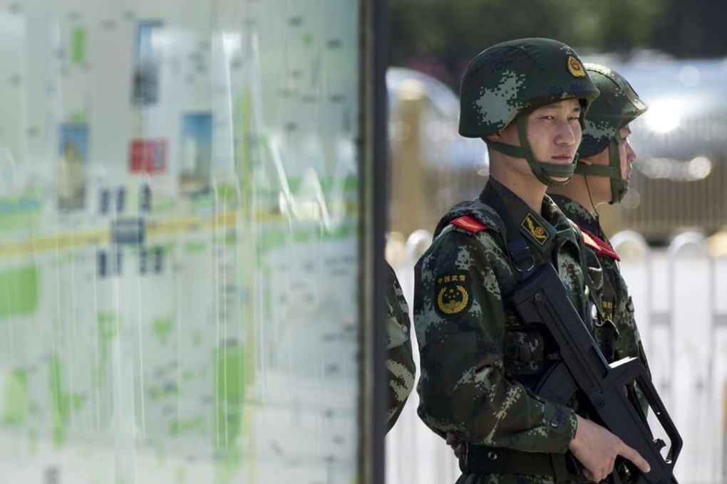 A file picture of a paramilitary policeman on patrol in Beijing after a spate of attacks the authorities blamed on militants from Xinjiang. Photo: AP
