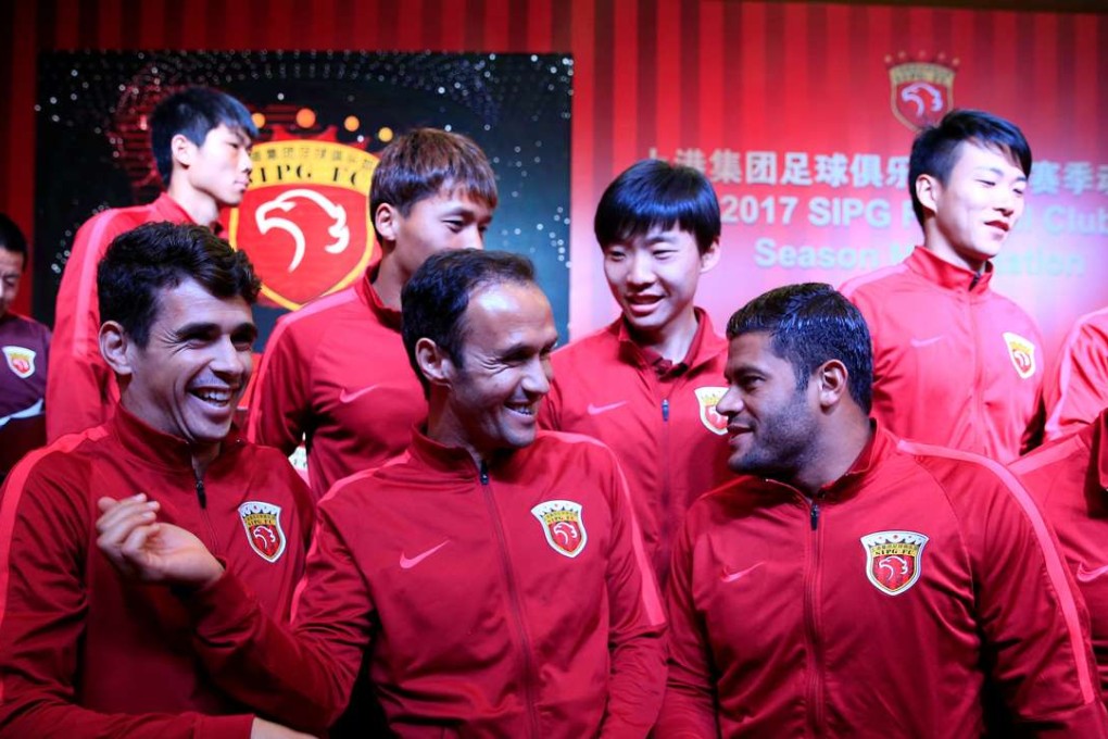 Ricardo Carvalho (front, centre) with his Shanghai SIPG teammates Oscar (left) and Hulk (right). Photo: Reuters