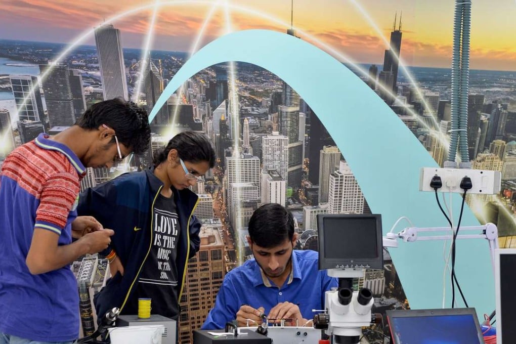 Interns work at Bangalore start-up company Hacklab.in. In the basement of a Bangalore building, hundreds of young Indians sit in neat rows of desks typing furiously, all dreaming of becoming the new Steve Jobs or Mark Zuckerberg. A quarter of a century after liberalisation kick-started India's economic transformation, a new generation of young people are capitalising on their parents' hard-won financial security to try their luck in the risky business of tech start-ups. / Photo: AFP