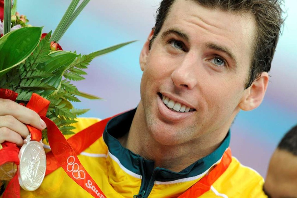 Grant Hackett of Australia holds his silver medal for the men’s 1500m freestyle swimming final at the National Aquatics Centre during the Beijing 2008 Olympic Games. Photo: Reuters