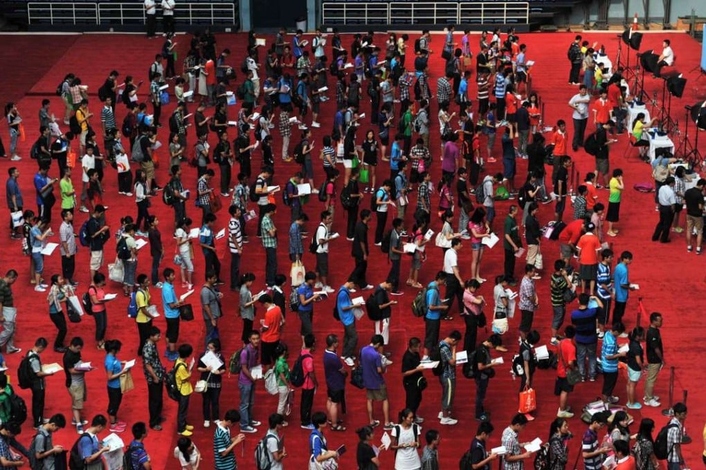 First year students queue for IDs during enrolment day at Tsinghua University in Beijing. Photo: Xinhua
