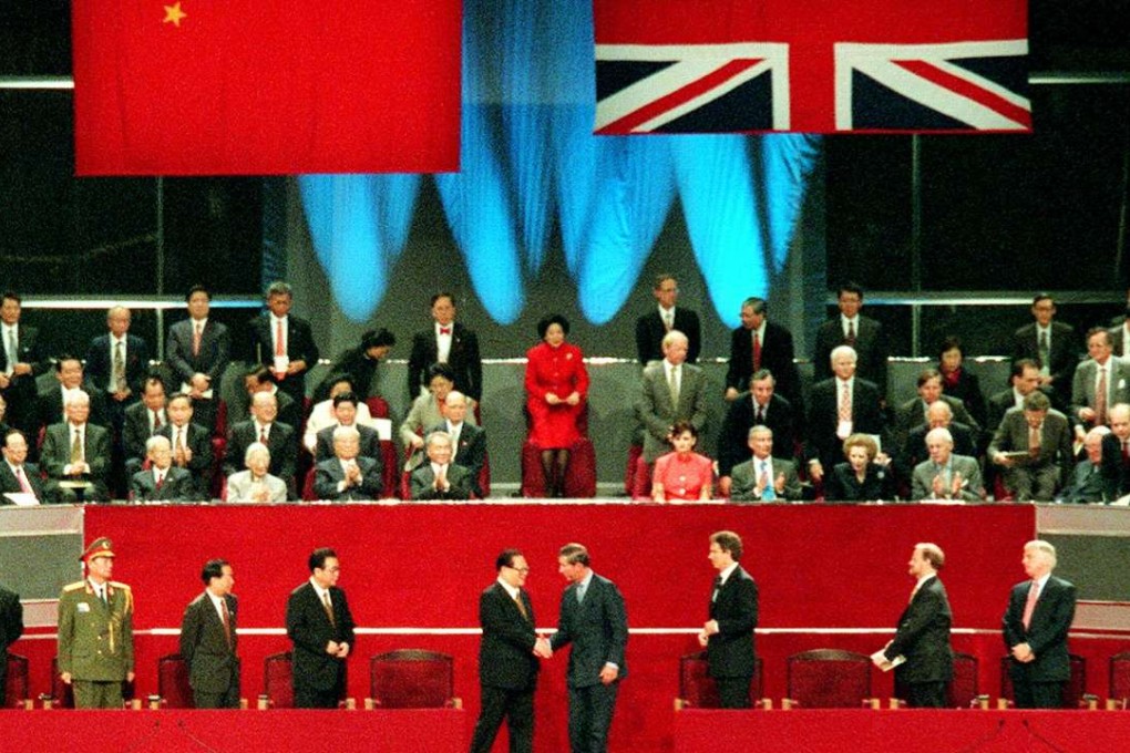 Then president Jiang Zemin shakes hands with Britain’s Prince Charles at the Hong Kong handover ceremony to mark the city’s return to Chinese sovereignty, in the first minutes of July 1, 1997. Photo: Robert Ng