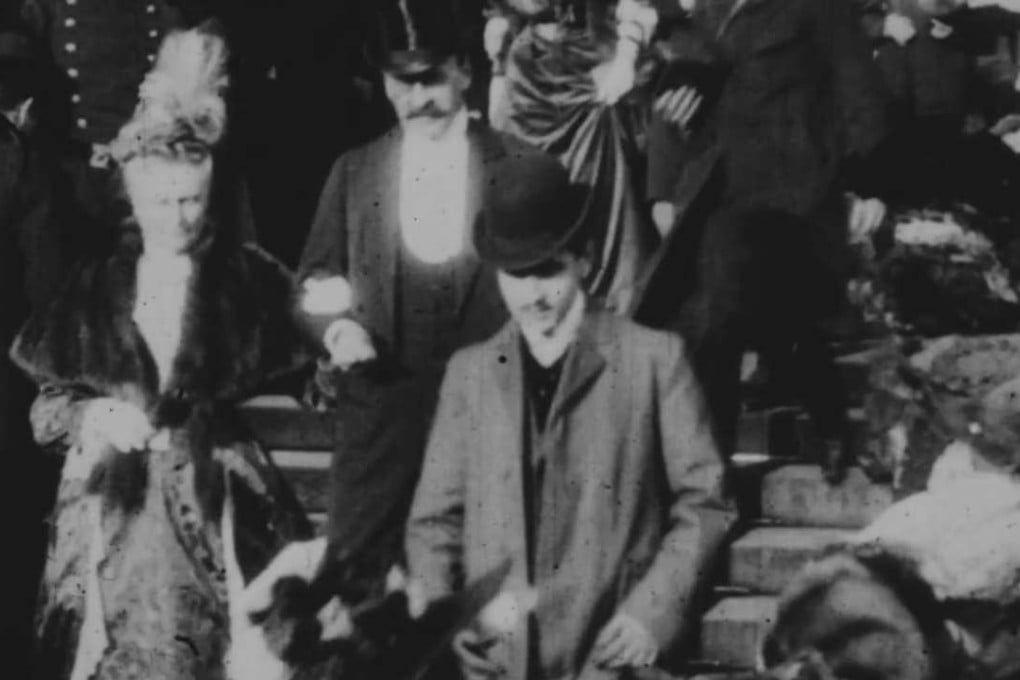A still image from film footage of a 1904 wedding shows a man in a bowler hat believed to be the French novelist Marcel Proust. Photo: Centre National du Cinéma