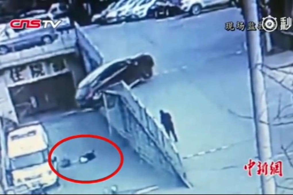 Surveillance footage showed the mother crawling over to her child to protect him using her body. Photo: Handout