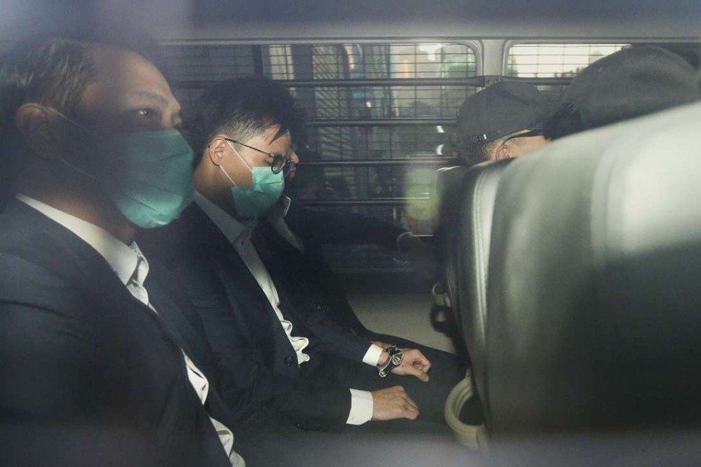 Constable Lau Hing-pui (L) and Senior Inspector Lau Cheuk-ngai (R, wearing glasses) are escorted by Correctional Services Department (CSD) officers in the vehicle while departing the District Court in Wan Chai. Photo: Sam Tsang
