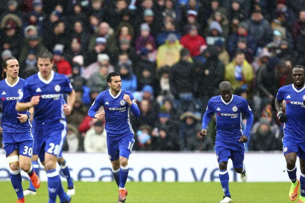 Chelsea's Pedro (third left) celebrates scoring his side's first goal against Burnley. Photo: AP