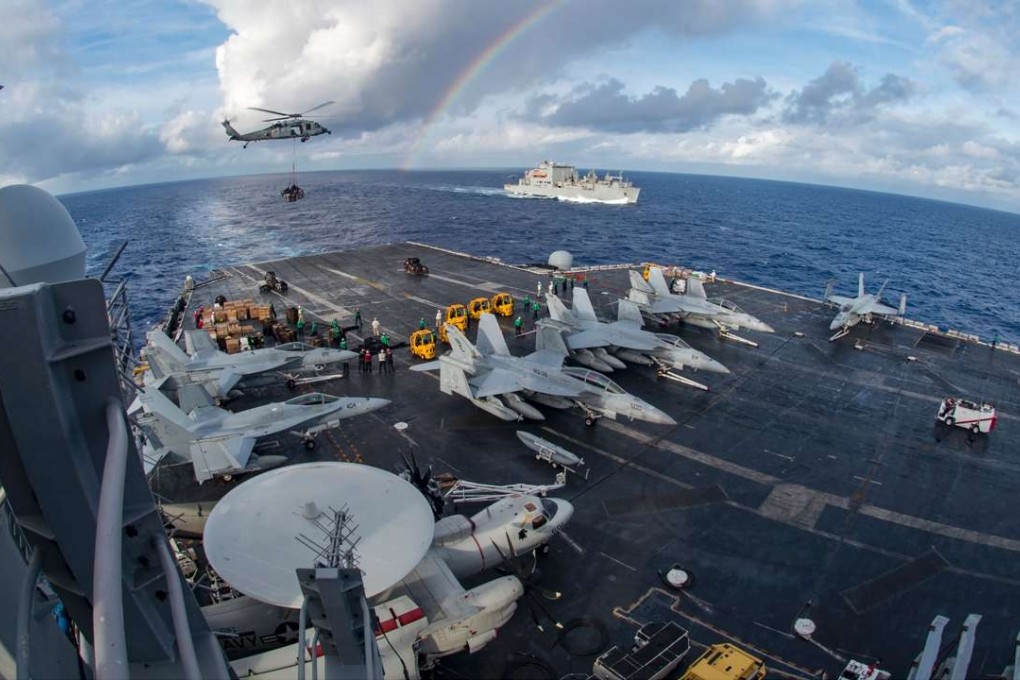 The aircraft carrier USS Carl Vinson participates in a vertical replenishment-at-sea exercise in the Pacific Ocean on February 3. Photo: AFP
