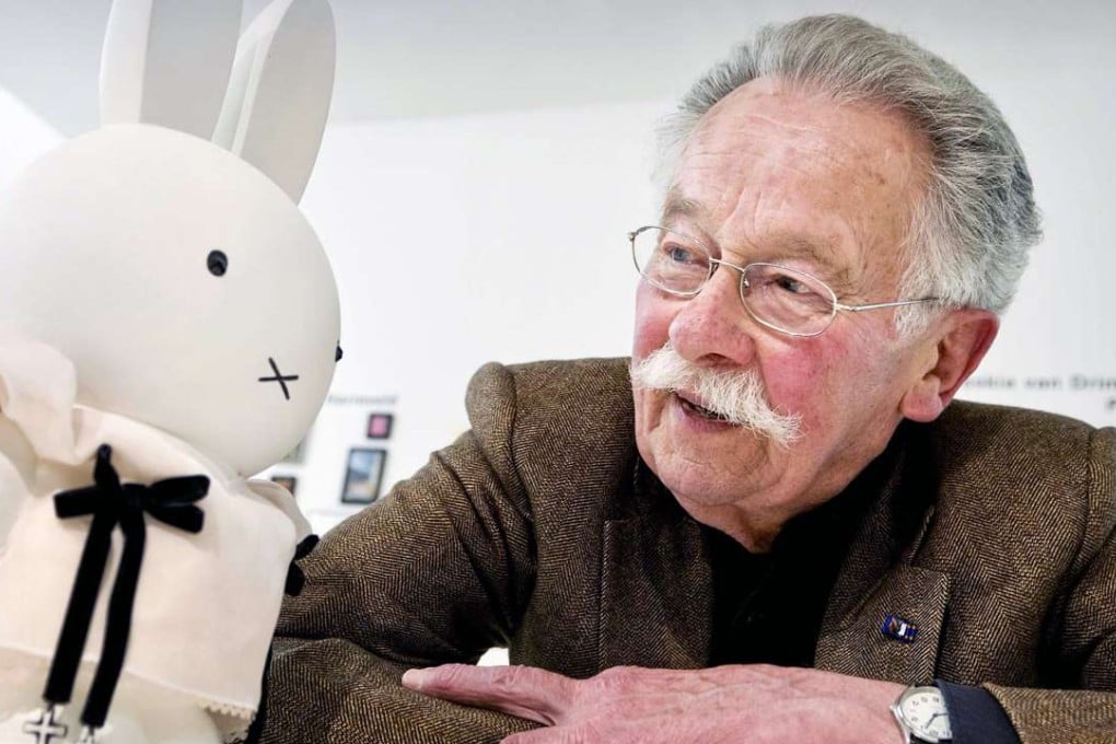 Dutch author and illustrator Dick Bruna poses next to a Nijntje or Miffy at the Dick Bruna Huis in Utrecht, Netherlands. Photo: EPA