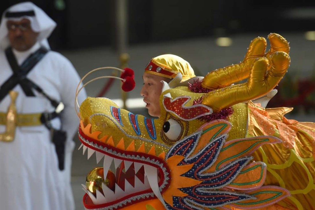 A Chinese traditional dance teams performs at the inauguration ceremony of the Yanbu Aramco Sinopec Refining Company project in Riyadh. Photo: AFP